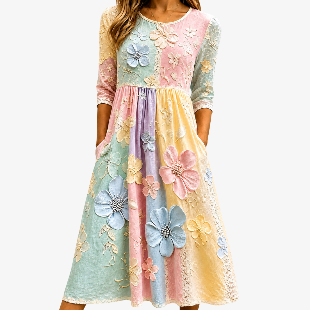 רקפת | שמלת מידי עם כיסים בהדפס גן בפסטל