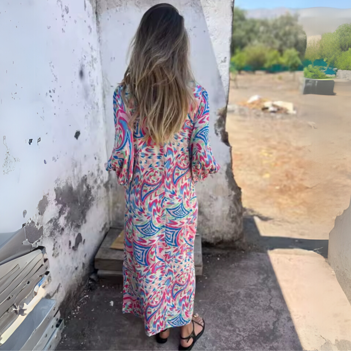 ניצה | שמלת אביב מקסי מודפסת עם כיסים ושרוולים ארוכים
